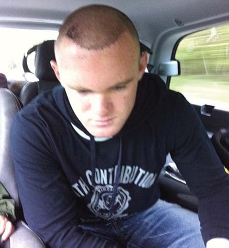 Rooney si-a aratat “parul” de 30.000 de lire
