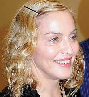 Madonna si-a acceptat in sfarsit ridurile