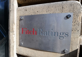 Fitch a retrogradat Portugalia in categoria „junk”, nerecomandata investitorilor