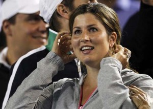 Miroslava Vavrinec, wife of Roger Federer of Switzerland, smiles after his victory over Britain - Ziarul National's Andy Murray in the men's singles final at the Australian Open tennis tournament in Melbourne