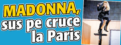 Madonna, sus pe cruce la Paris