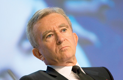 Patronul Louis Vuitton fuge din Franta