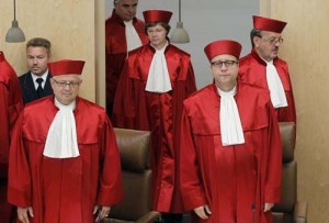 President of the German Constitutional Court Vosskuhle and other judges arrive for the proclamation of a verdict on the German Government - Ziarul National's European Stability Mechanism and the Euro Plus Pact in Karlsruhe