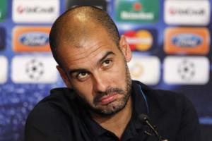 Barcelona soccer coach Guardiola speaks to reporters during a news conference at Parken stadium in Copenhagen - Ziarul National