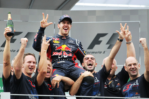 Campionul Vettel, laudat inclusiv de Angela Merkel