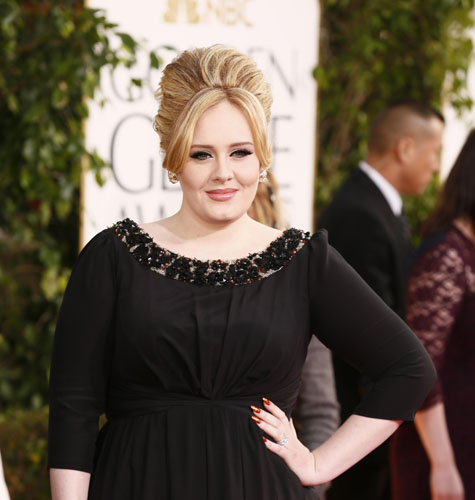 Adele si-a botezat “Alunita” Angelo
