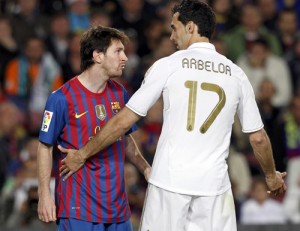 Barcelona - Ziarul National's Messi argues with Real Madrid's Arbeloa during their Spanish first division "El Clasico" soccer match in Barcelona
