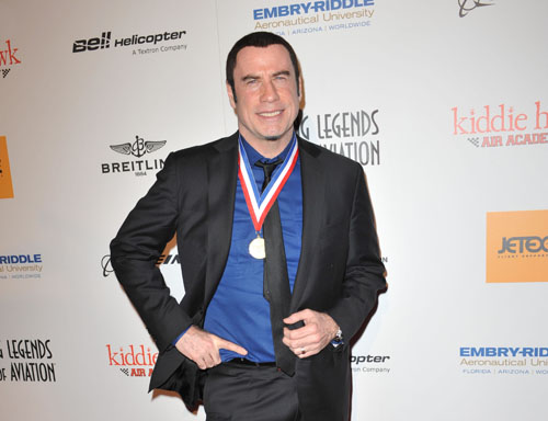John Travolta a trecut de la masori la barmani