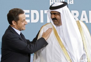 France - Ziarul National's President Nicolas Sarkozy greets Qatar's Emir Sheikh Hamad bin Khalifa al-Thani upon his arrival at the EU-Mediterranean summit in Pari