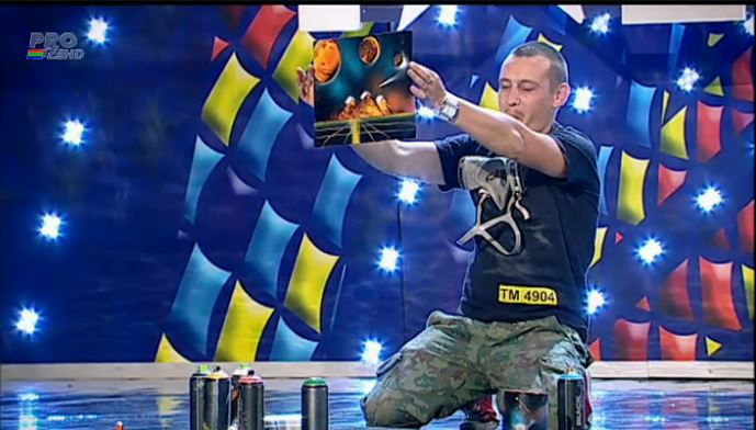 A socat la “Romanii au talent” cand a inceput sa picteze cu spray-uri si foc!