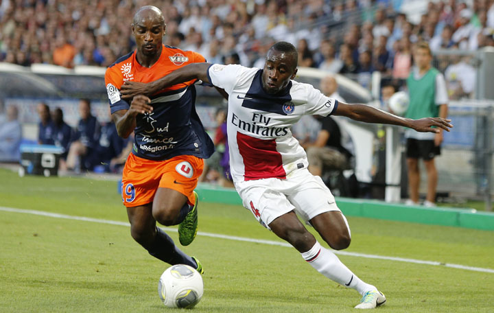 Paris Saint-Germain - Ziarul National's Matuidi challenges Montpellier's Camara during their French Ligue 1 soccer match in Montpellier