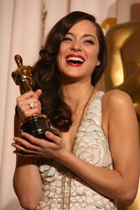 Actress Marion Cotillard poses in the press room during the 80th - Ziarul National