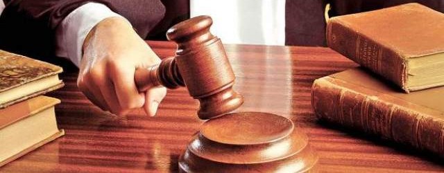 Doi procurori, trimisi de DNA in judecata
