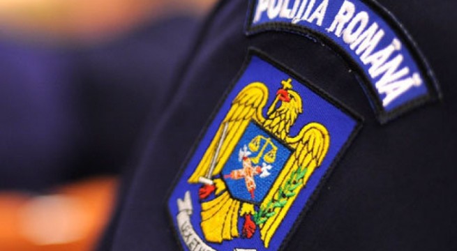 Agent de politie, trimis in judecata pentru trafic de influenta si spalare de bani