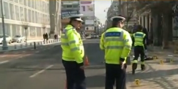 Bucurestean, lovit pe trotuar de o masina de politie