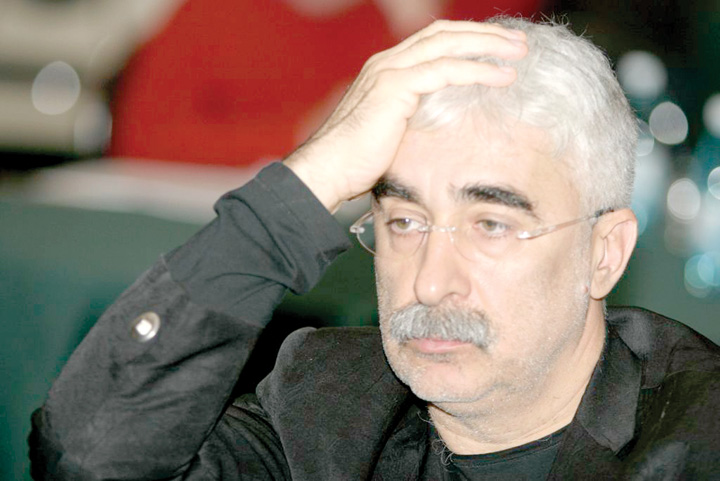 adrian-sarbu-cu-mana-in-cap - Ziarul National