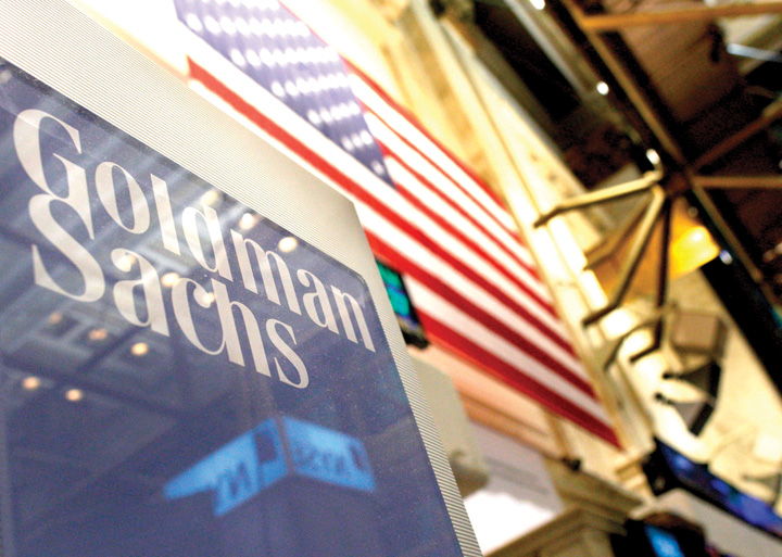 A Goldman Sachs sign is seen above their booth on the floor of the New York Stock Exchange - Ziarul National