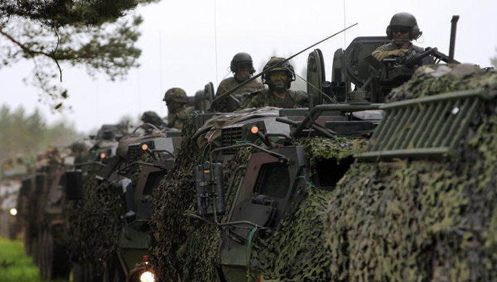 Tarile membre NATO din estul Europei cer baze permanente pe teritoriile lor