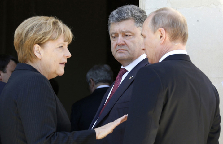 Merkel ii cere lui Putin sa faca presiuni asupra separatistilor din Ucraina