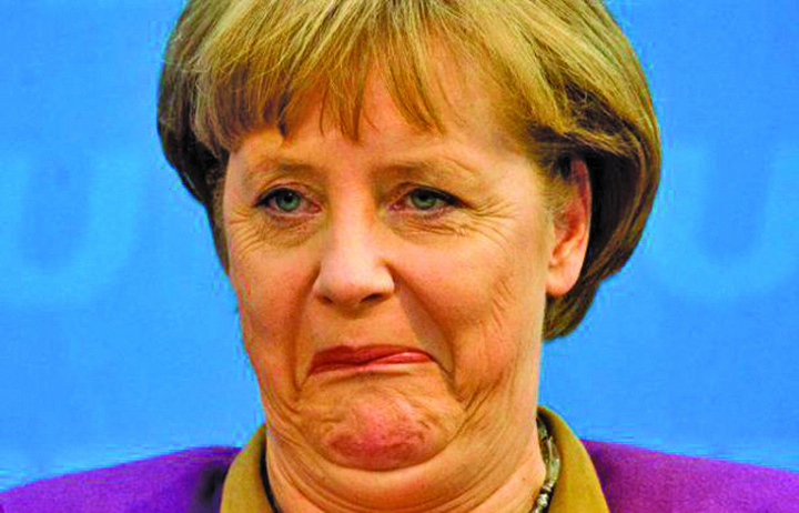 Angela Merkel ingenunchiata de refugiati