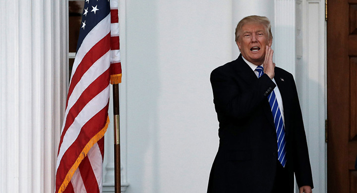 Trump il acopera pe hackerul sef de la Kremlin