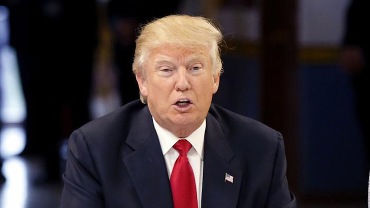 Umbra lui Trump planeaza la Salonul Auto din Detroit