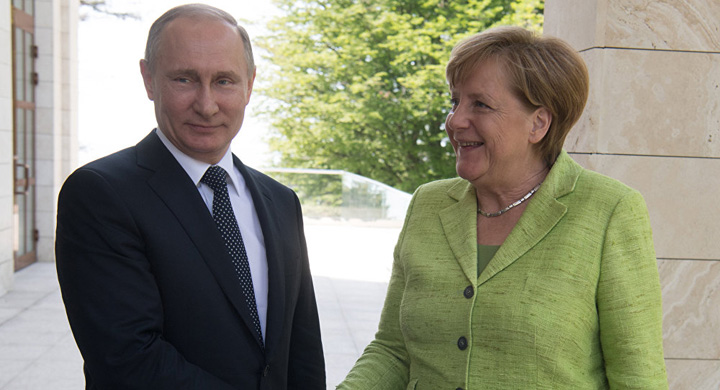 Putin, luat la rost de Merkel pe tema homosexualilor