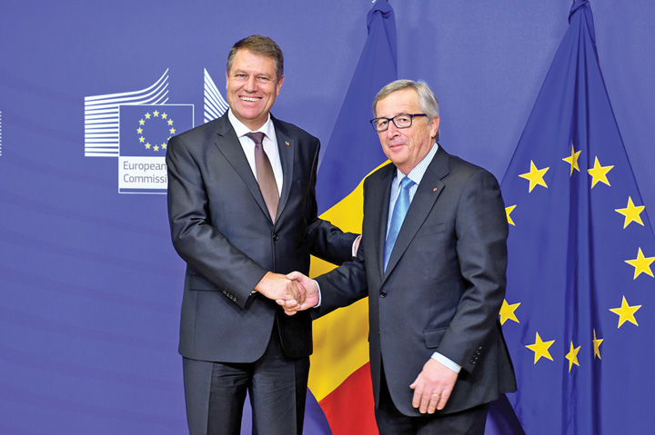 Juncker, Iohannis te trage-n piept cu statul de drept