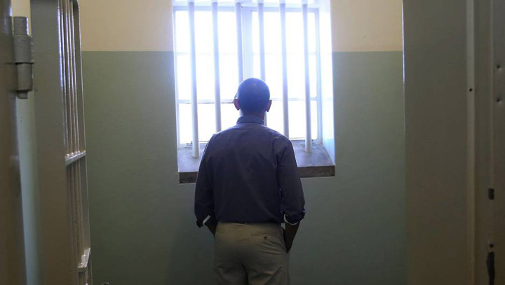 US President Obama stands in prison cell where Nelson Mandela was held on Robben Island South Africa - Ziarul National