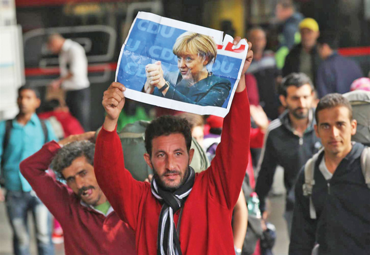 Merkel vrea iar migranti, dar calificati