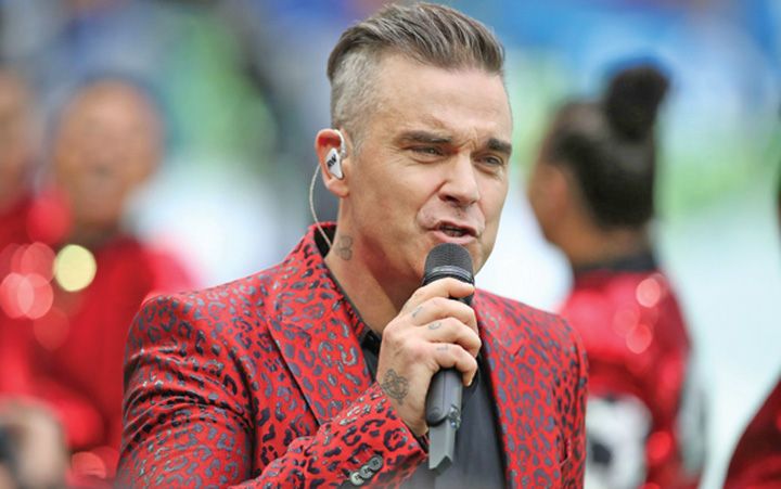 Robbie Williams, ţintuit în casă 3 ani