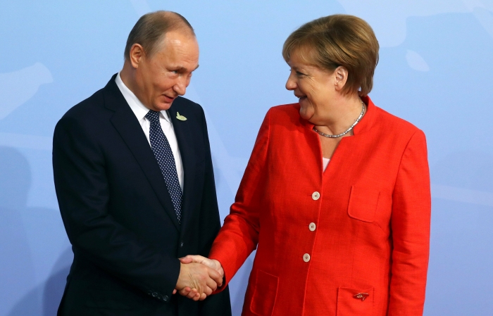 Merkel și Putin, vaccin comun