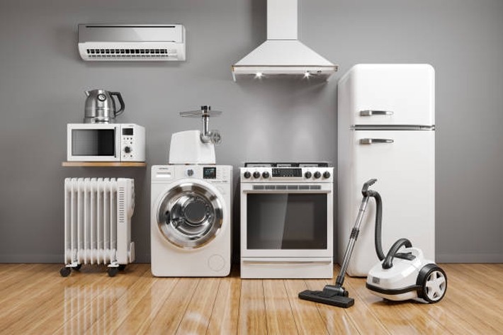 Set of home kitchen appliances in the room on the wall background. 3D render - Ziarul National